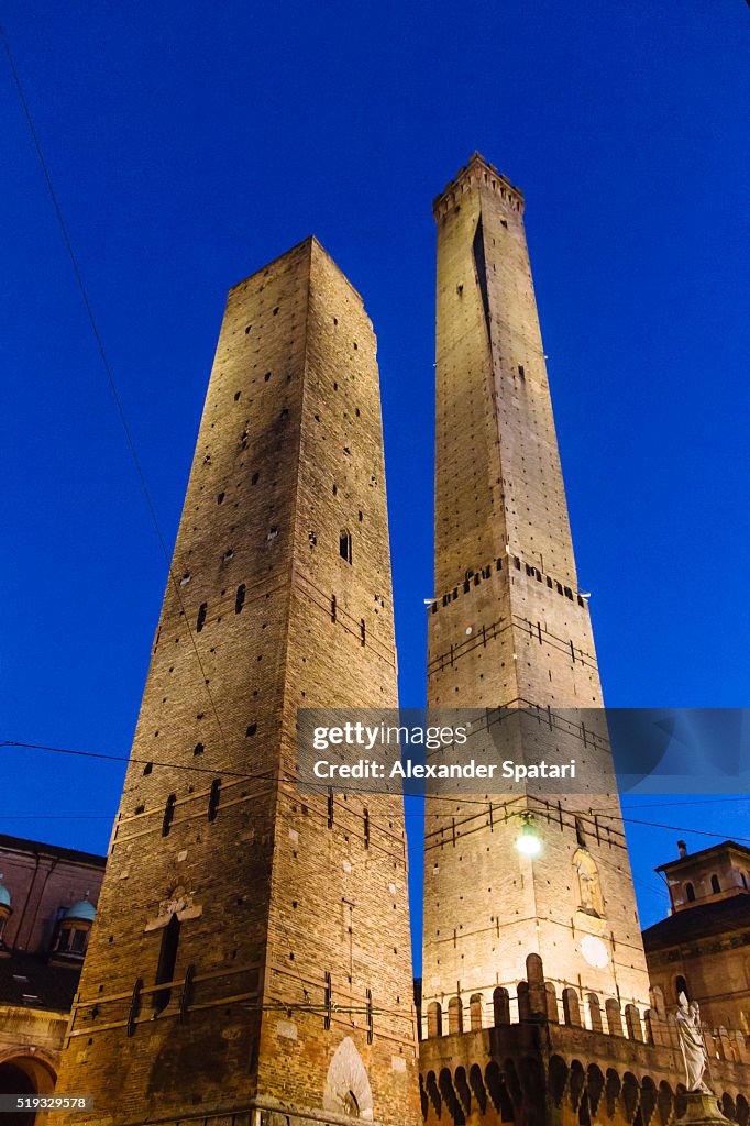 Two Towers (Due Torri) at night in Bologna, Emilia-Romagna, Italy