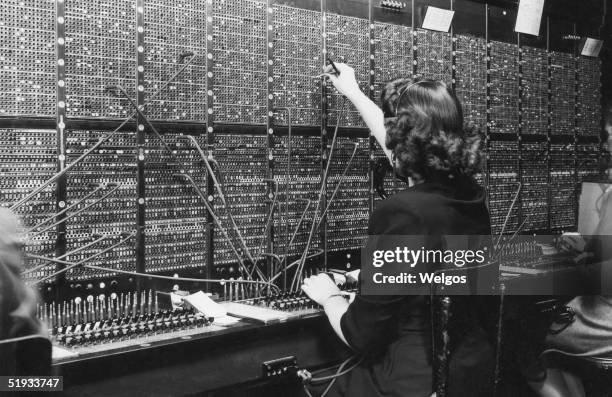 Switchboard operator at work, circa 1945.