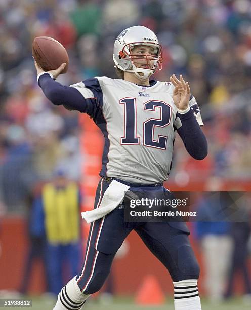 Tom Brady of the New England Patriots passing against the Cincinnati Bengals at Gillette Stadium on December 12, 2004 in Foxborough, Massachusetts....