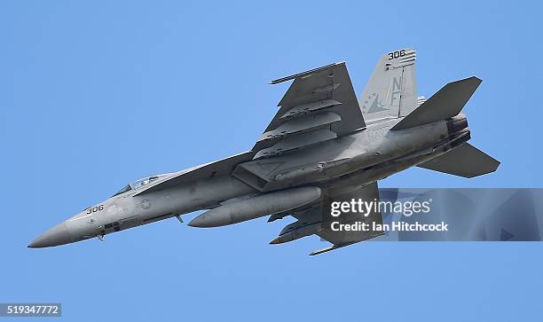 An F/A 18E Super Hornet from the United States Navy fighter squadron VFA-115 conducts a strafing run on April 6, 2016 in Townsville, Australia....