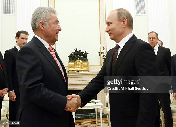 Russian President Vladimir Putin greets Austrian President Heinz Fischer during their meeting at the Kremlin, April 2016 in Moscow Russia.