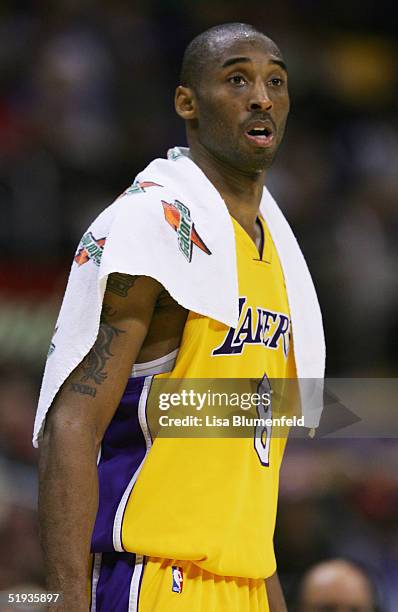 Kobe Bryant of the Los Angeles Lakers looks on during the game against theToronto Raptors on December 28, 2004 at Staples Center in Los Angeles,...