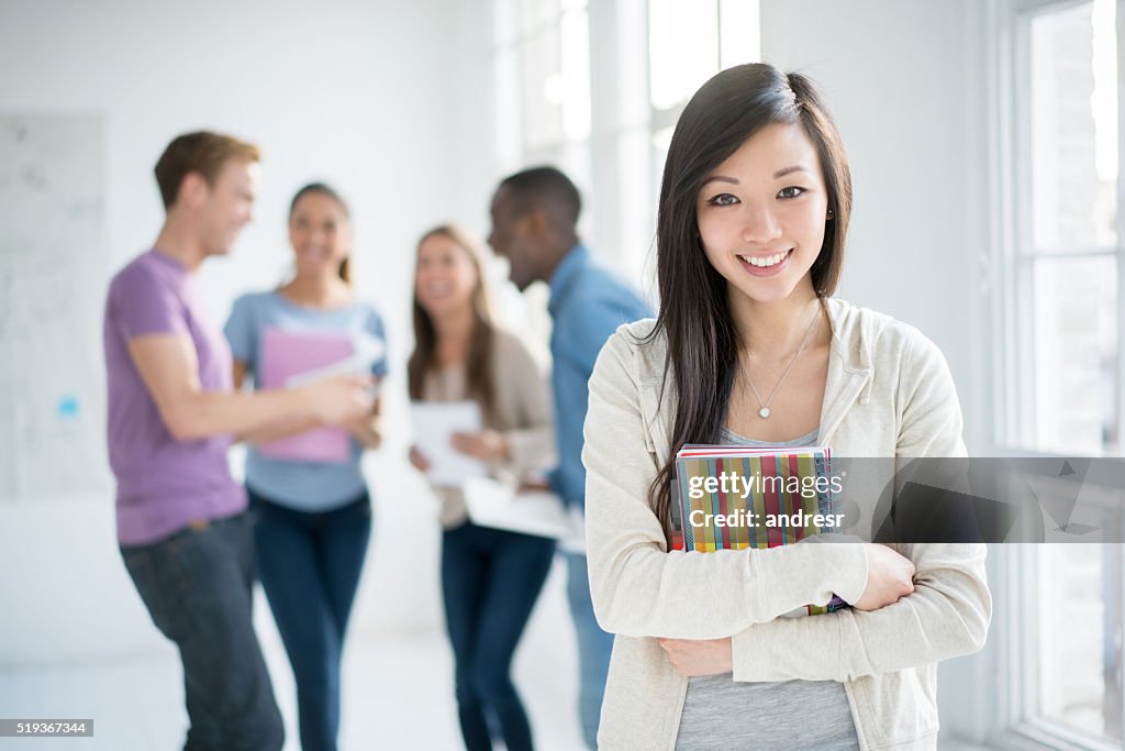 Asian student with a group of people