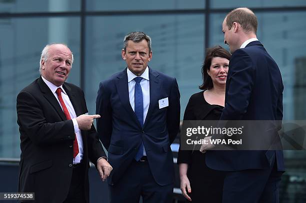 Britain's Prince William, Duke of Cambridge, is met by Chairman of the FA Greg Dyke , Chief Executive Officer of the FA Martin Glenn and Wembley...