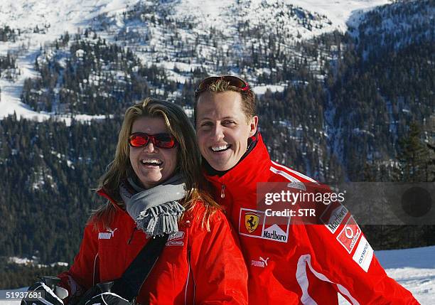 German Formula 1 driver Michael Schumacher poses with his wife Corinna, in the winter resort of Madonna di Campiglio, in the Dolomites area, Northern...