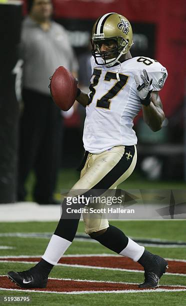 Wide receiver Joe Horn of the New Orleans Saints celebrates in the endzone during the game against the Atlanta Falcons at the Georgia Dome on...