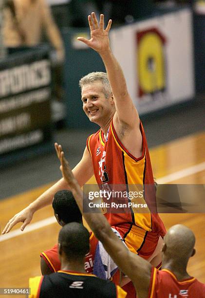 Andrew Gaze of the Tigers iis chaired off by teammates after his 600th NBL match the round 16 NBL match between the Melbourne Tigers and the Adelaide...