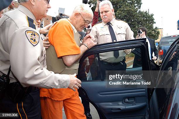 Edgar Ray Killen , 79-years-old, is escorted by police from the Neshoba County Courthouse January 12, 2005 in Philadelphia, Mississippi. Killen has...