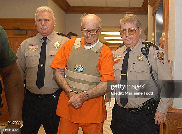Edgar Ray Killen , 79-years-old, is escorted by police inside the Neshoba County Courthouse January 12, 2005 in Philadelphia, Mississippi. Killen has...