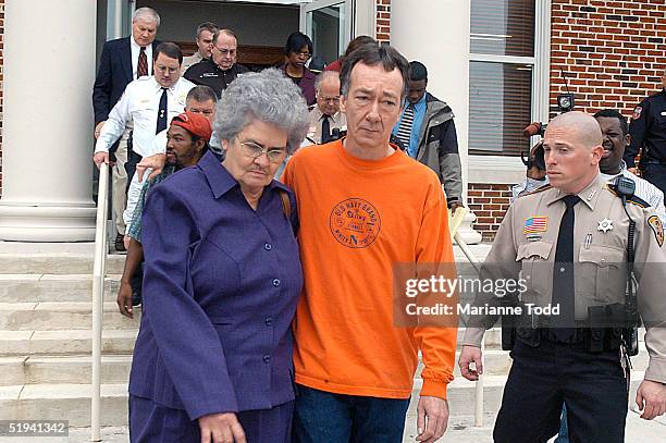 The wife of Edgar Ray Killen, Betty Joe Killen , is escorted by her son away from the Neshoba County Courthouse January 12, 2005 in Philadelphia,...