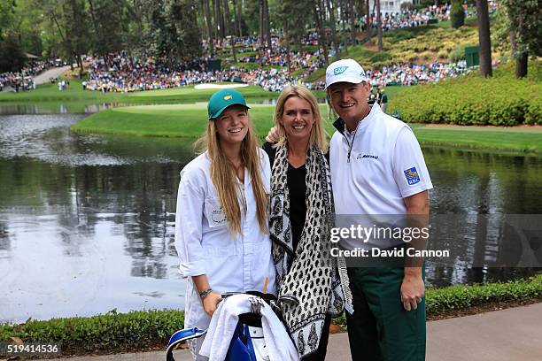 Ernie Els of South Africa poses with his wife Liezl and daughter Samantha during the Par 3 Contest prior to the start of the 2016 Masters Tournament...