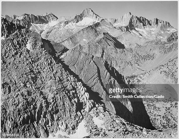 Black and white photograph of rocky mountain range, captioned "Mount Brewer, Kings River Canyon ", by Ansel Adams, from Photographs of National Parks...