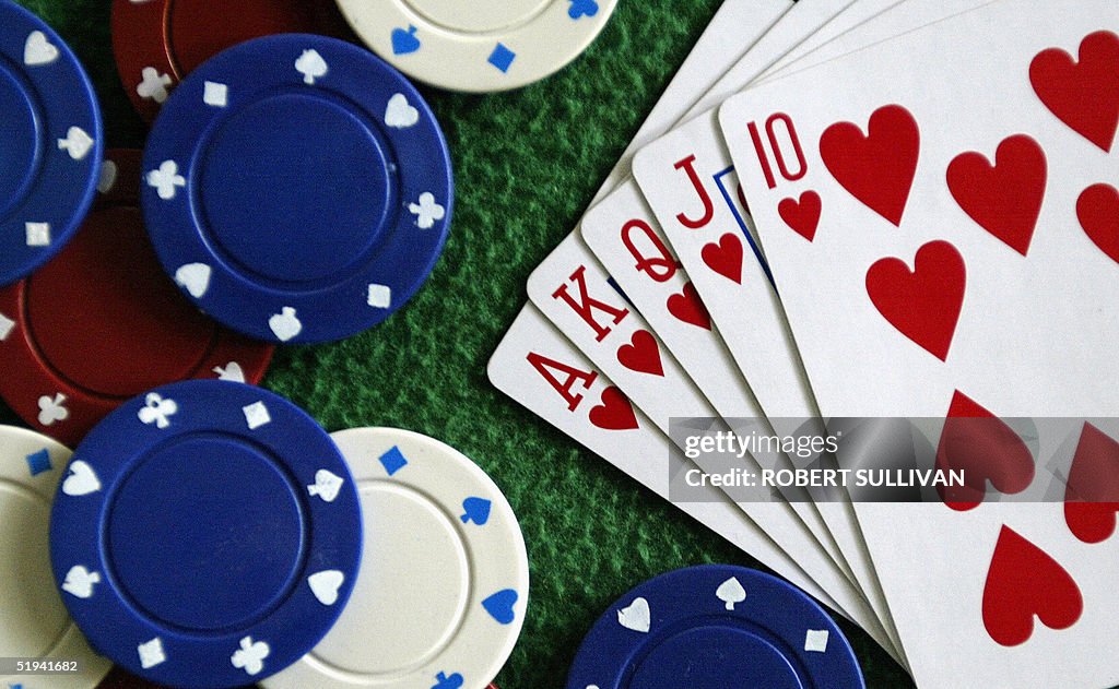 Chips, a deck of cards and a green mat,