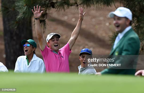 Golfers Justin Thomas and Rickie Fowler celebrate after both made a hole-in-one at the 4th during the Par 3 contest prior to the start of the 80th...