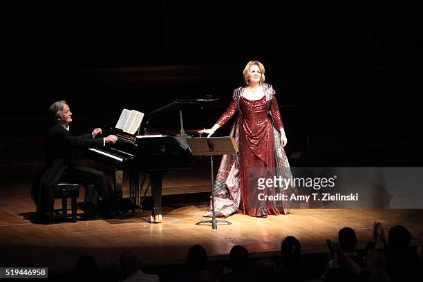 Soprano Renee Fleming is accompanied by Hartmut Holl on piano singing works by composers Schumann, Rachmaninov, Barber and Strauss in recital as part...