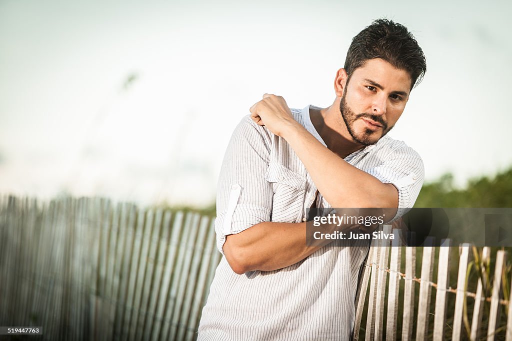 Portrait of man on beach, Miami Beach, Florida