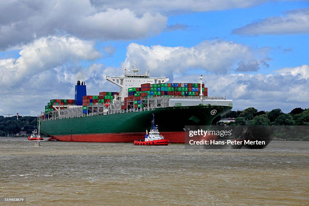 Container vessel on Elbe river, Hamburg, Germany