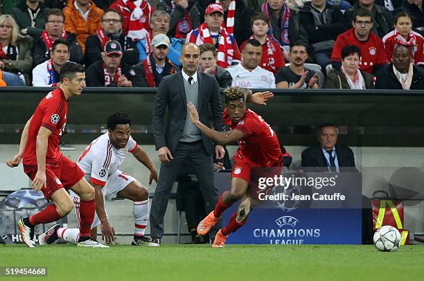 Coach of Bayern Muenchen Pep Guardiola looks at Kingsley Coman of Bayern Muenchen during the UEFA Champions League quarter final first leg match...