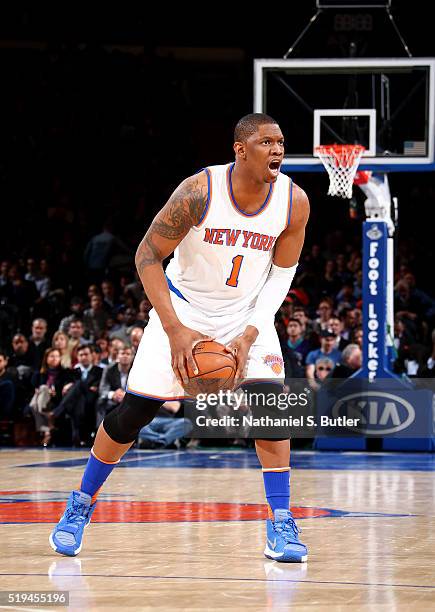 Kevin Seraphin of the New York Knicks handles the ball against the Charlotte Hornets on April 6, 2016 at Madison Square Garden in New York City. NOTE...