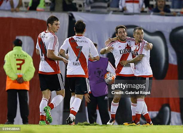 Camilo Mayada of River Plate celebrates with teammates after scoring the third goal of his team during a match between River Plate and The Strongest...