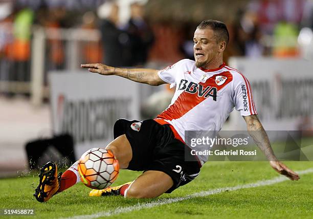 Andres D'Alessandro of River Plate slides for the ball during a match between River Plate and The Strongest as part of Copa Bridgestone Libertadores...