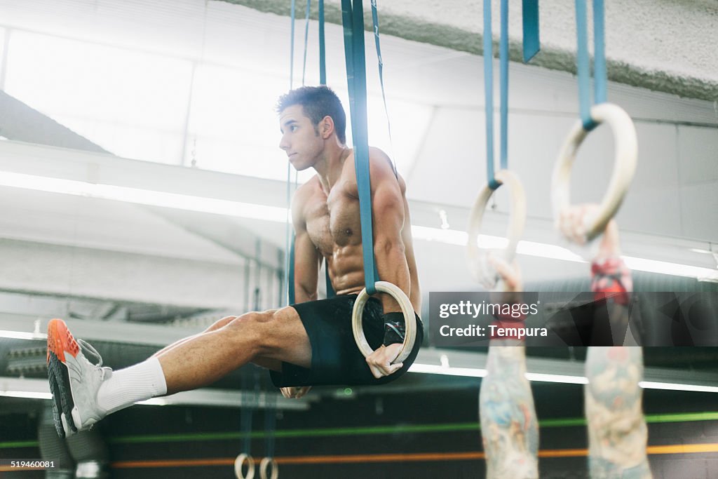 Young muscular man practicing intensity training.