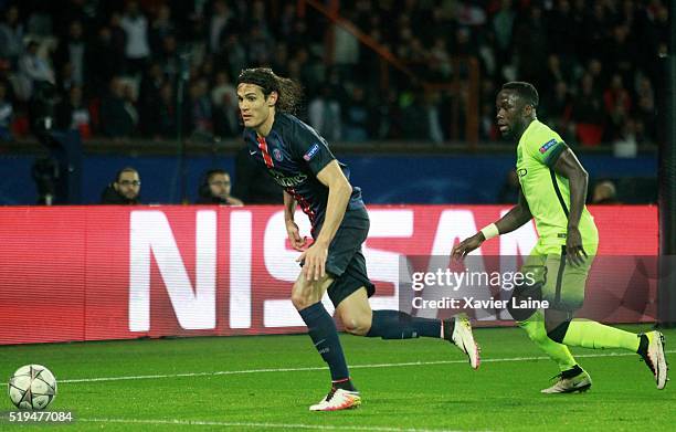 Edinson Cavani of Paris Saint-Germain in action with Bacary Sagna of Manchester City FC during the UEFA Champions League Quarter Final between Paris...