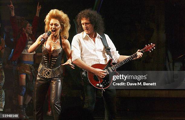 Actress Mazz Murray joins musician Brian May with the on-stage band for the 1000th performance of Ben Elton's musical "We Will Rock You" at the...