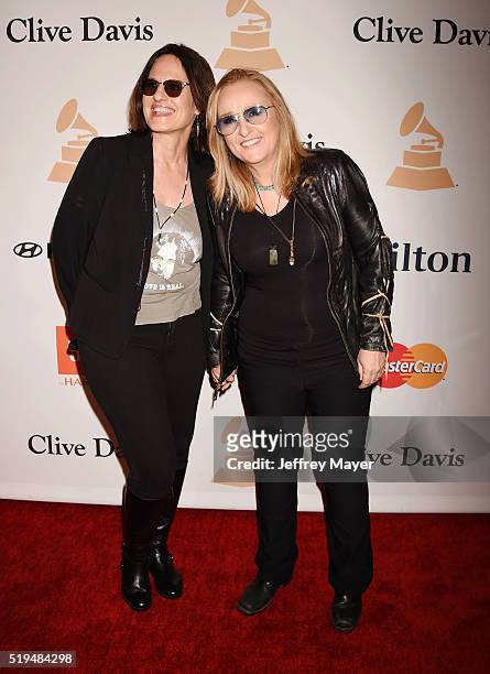 Musician Melissa Etheridge and actress Linda Wallem attend the 2016 Pre-GRAMMY Gala and Salute to Industry Icons honoring Irving Azoff at The Beverly...