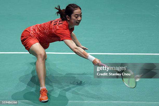 Wang Shixian of China returns to Pai Yu Po of Chinese Taipei during day three of the Women Singles during the BWF World Super Series Badminton...