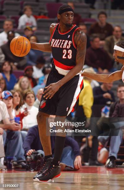 Darius Miles of the Portland Trail Blazers looks to pass during the game with the Detroit Pistons on December 18, 2004 at the Palace of Auburn Hills,...