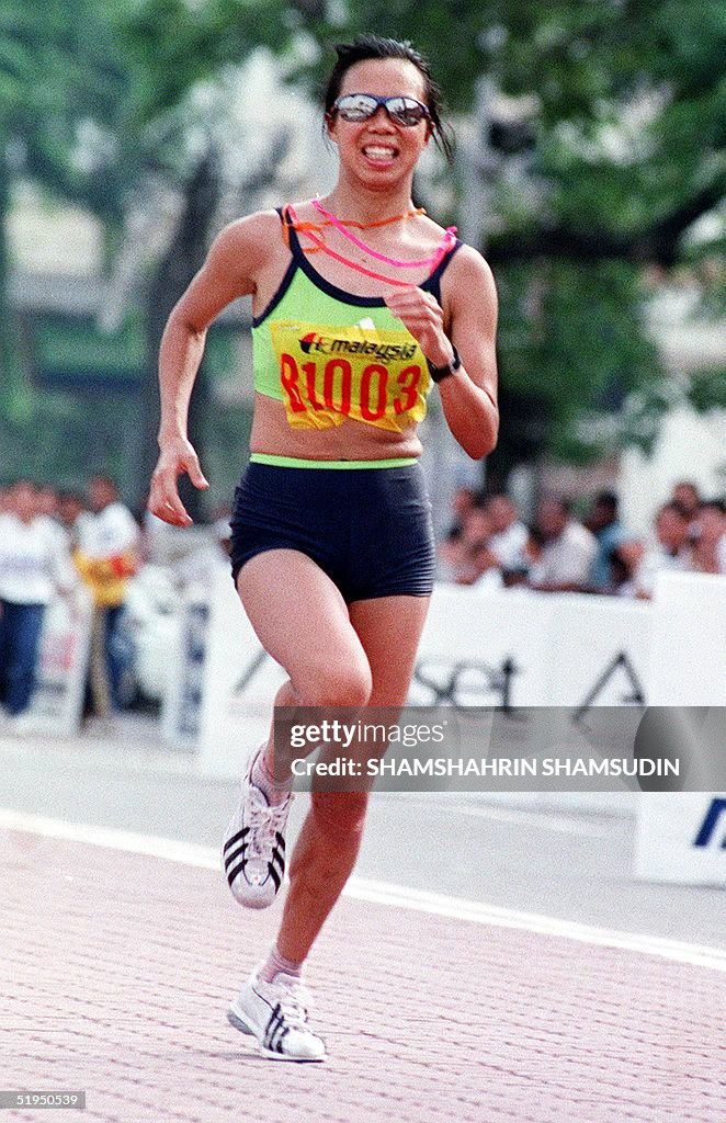 Malaysian Yuan Yufang sprints to the finish in the