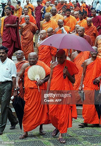 Buddhist monks at a meeting here 01 August 2000 to stage a meeting denouncing government plans to change the constitution and turn the country into a...