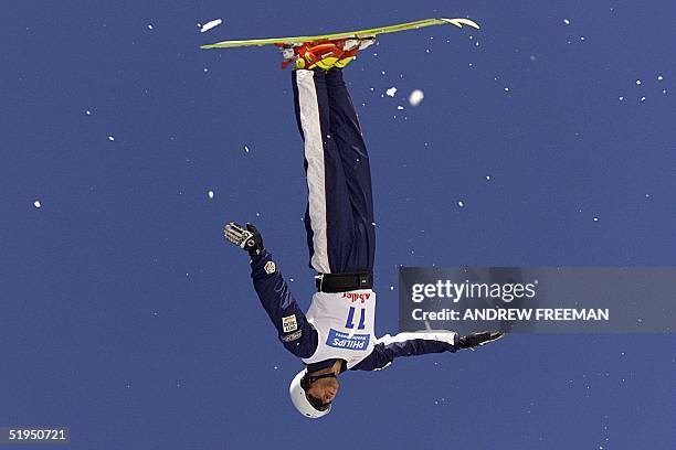 Current Olympic Champion Eric Bergoust from USA flips in mid-air, 12 August 2000, on his way to winning the Philips Mobile Phones World Aerials at Mt...