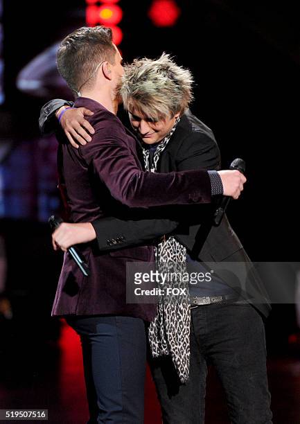 Contestant Trent Harmon and eliminated contestant Dalton Rapattoni hug onstage at FOX's American Idol Season 15 on April 6, 2016 at the Dolby Theatre...