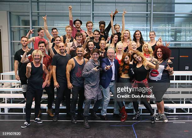 Ben Elton poses amongst performers during rehearsals for We Will Rock You on April 7, 2016 in Sydney, Australia.