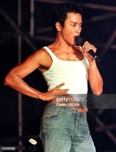 Hong Kong's king of pop, singer Leslie Cheung poses on stage during a solo concert at Shanghai Stadium late 16 September 2000. Cheung retired from...
