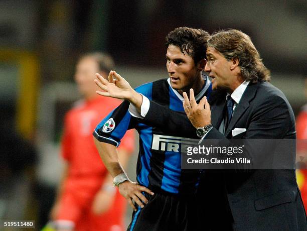 September 2006: Head coach FC Internazionale Roberto Mancini and Javier Zanetti chat during the Serie A 2006/2007 2th round match between Inter of...