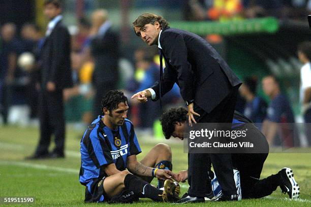 Head coach FC Internazionale Roberto Mancini and Marco Materazzi chat during Champions League match played between FC Internazionale and Basilea in...