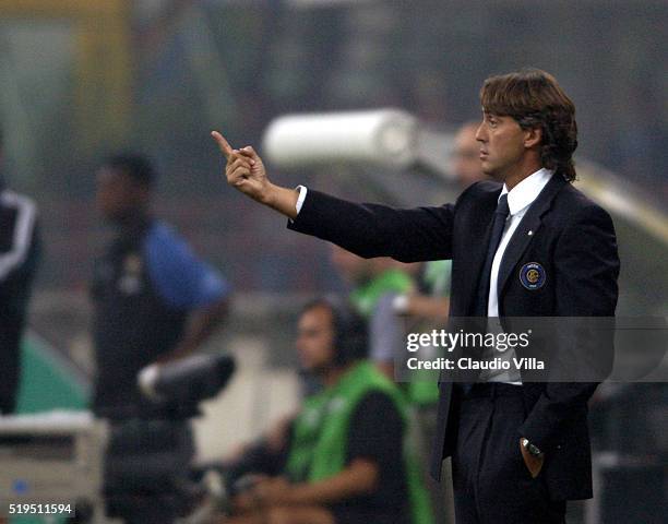 Head coach FC Internazionale Roberto Mancini reacts during Champions League match played between FC Internazionale and Basilea in Milan