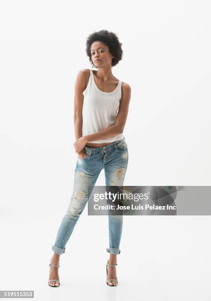 serious african american woman - jeans neri foto e immagini stock