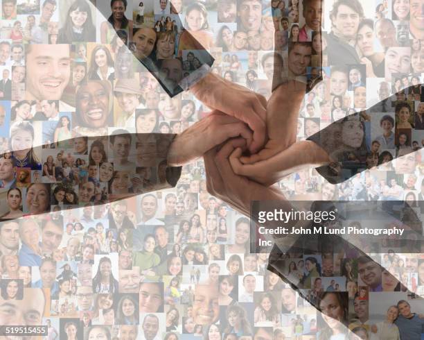 business people holding hands over montage of smiling faces - financial inclusion stock pictures, royalty-free photos & images