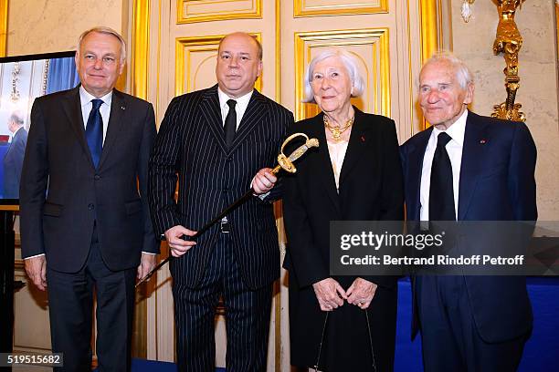 Politician Jean-Marc Ayrault, Marc Lambron, President of the sword Committee, Miss Claude Levi and Academician Jean d'Ormesson attend writer Marc...