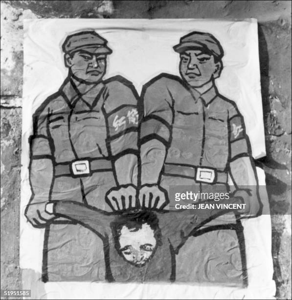 Poster is displayed in late 1966 in Beijing's street featuring how to deal with so-called "enemy of the people" during the Great Proletarian Cultural...