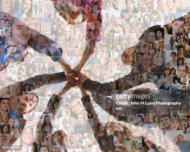 business people holding hands over montage of smiling faces - comunidad global fotografías e imágenes de stock