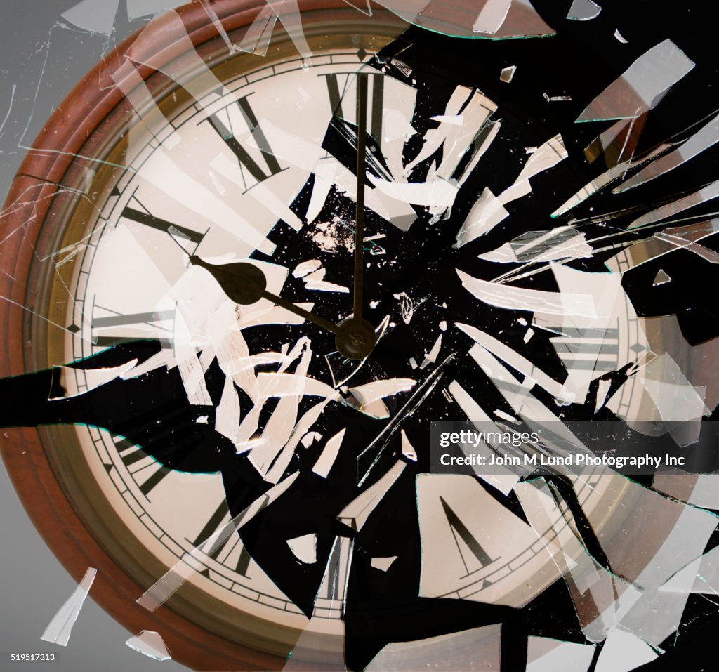 Close up of breaking clock face