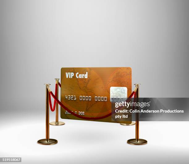 red rope barrier around vip credit card - red rope stock pictures, royalty-free photos & images