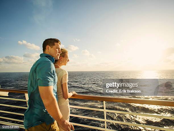 caucasian couple admiring view from boat deck - labadee fotografías e imágenes de stock