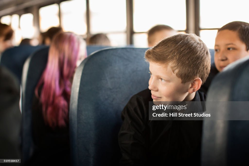 Students sitting on school bus