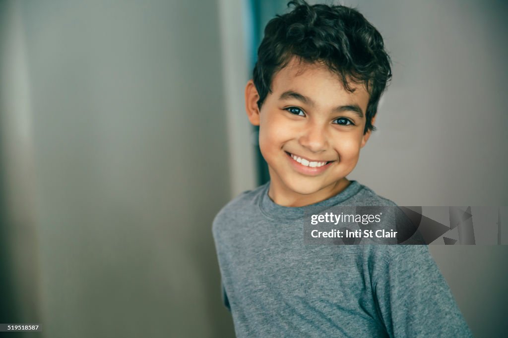 Mixed race boy smiling